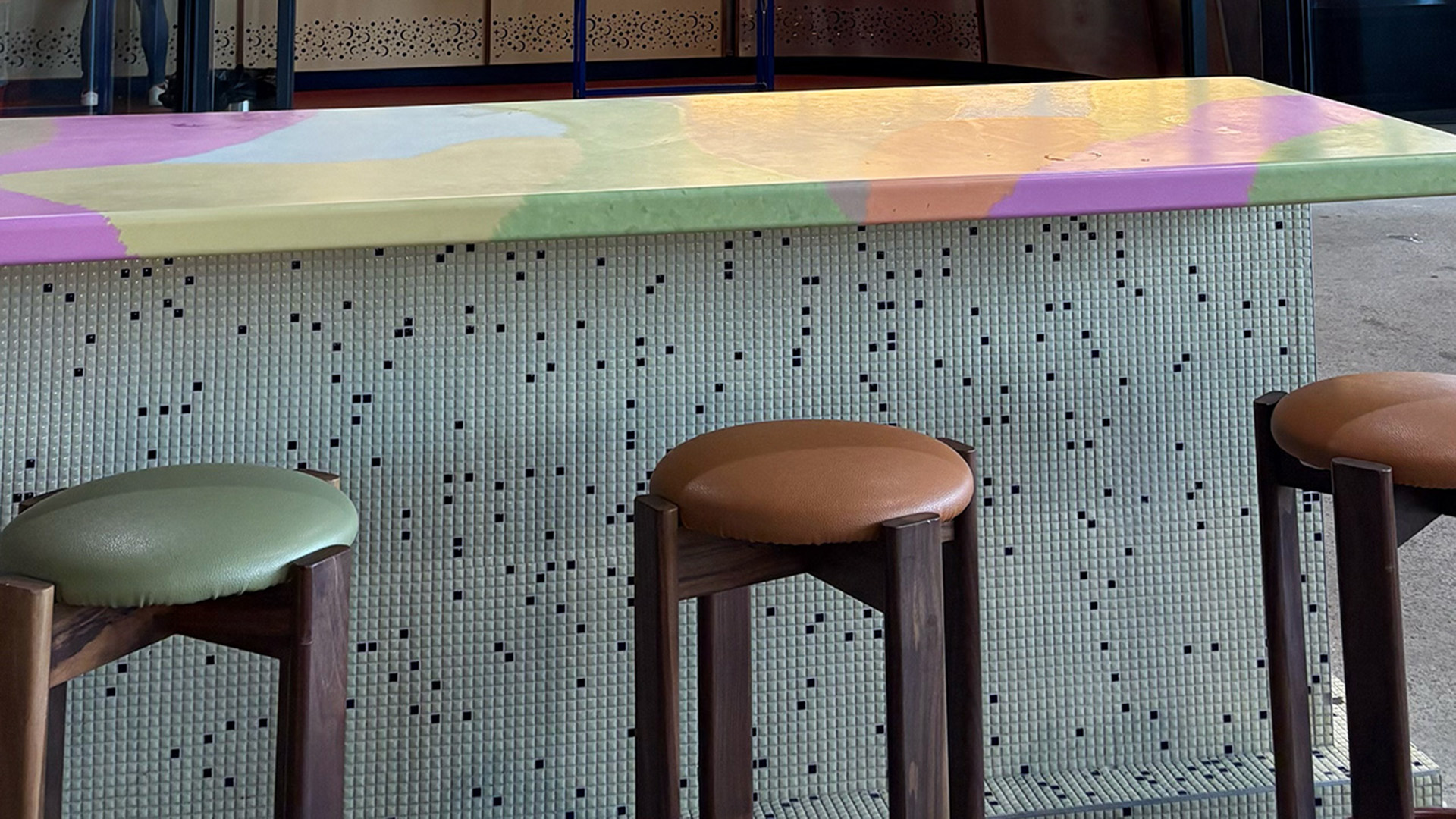 Bar seating and terrazzo top at Cow and The Moon